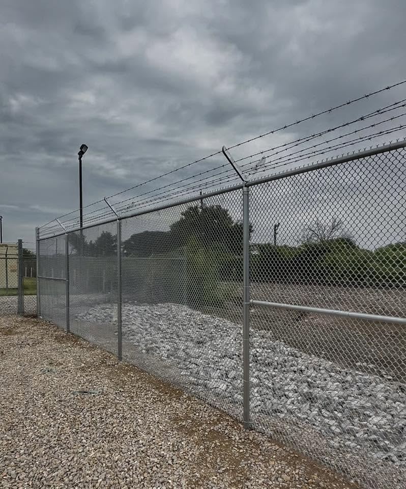Commercial Chain Link with Barbed Wire Security completed by Affordable Fencing in Azle, TX