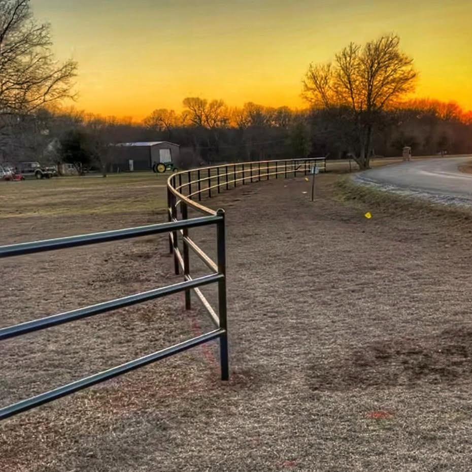 Curving Pipe Fence at a Ranch Perimeter completed by Affordable Fencing in Decatur, TX