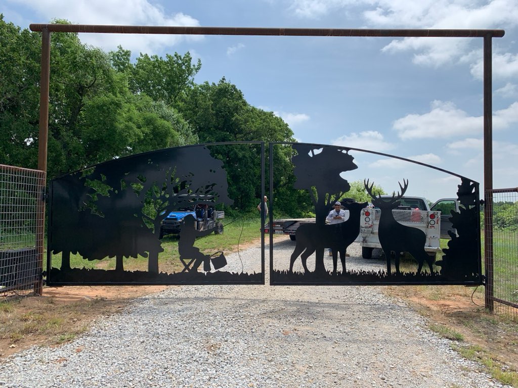 Custom Wildlife-Themed Metal Entry Gate completed by Affordable Fencing in Alvord, TX