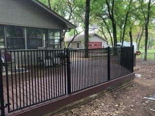 Ornamental Iron Patio & Deck Railing completed by Affordable Fencing in Decatur, TX