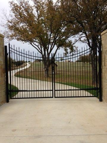 Ornamental Iron Fence & Driveway Columns completed by Affordable Fencing in Decatur, TX