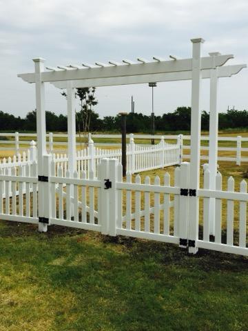 Vinyl Privacy Fence with Arbor Gate completed by Affordable Fencing in Decatur, TX