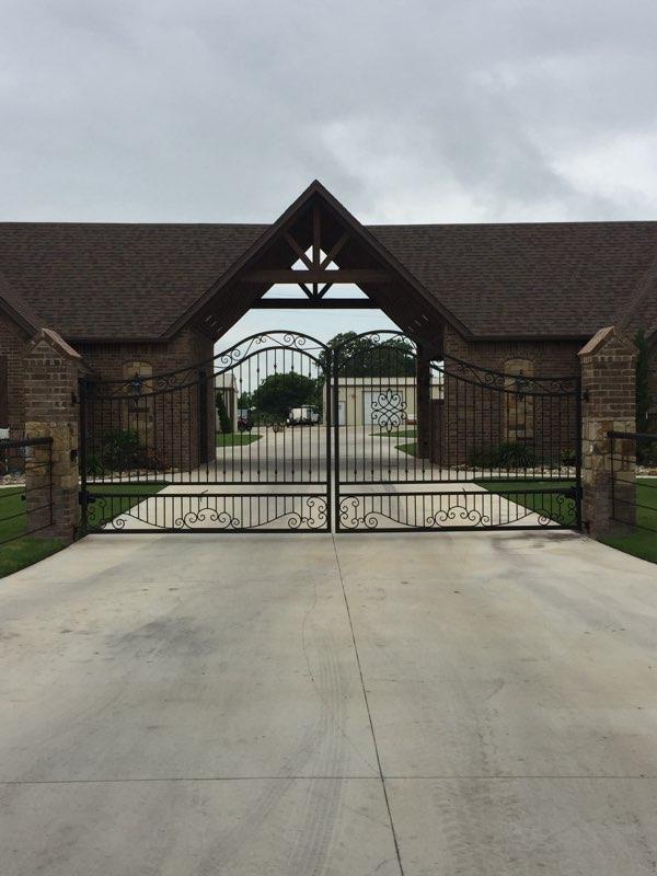 Custom Ornate Wrought Iron Estate Gate completed by Affordable Fencing in Decatur, TX